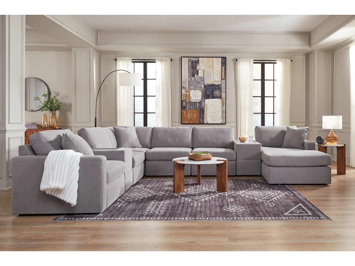 Spacious living room with large gray sectional sofa.